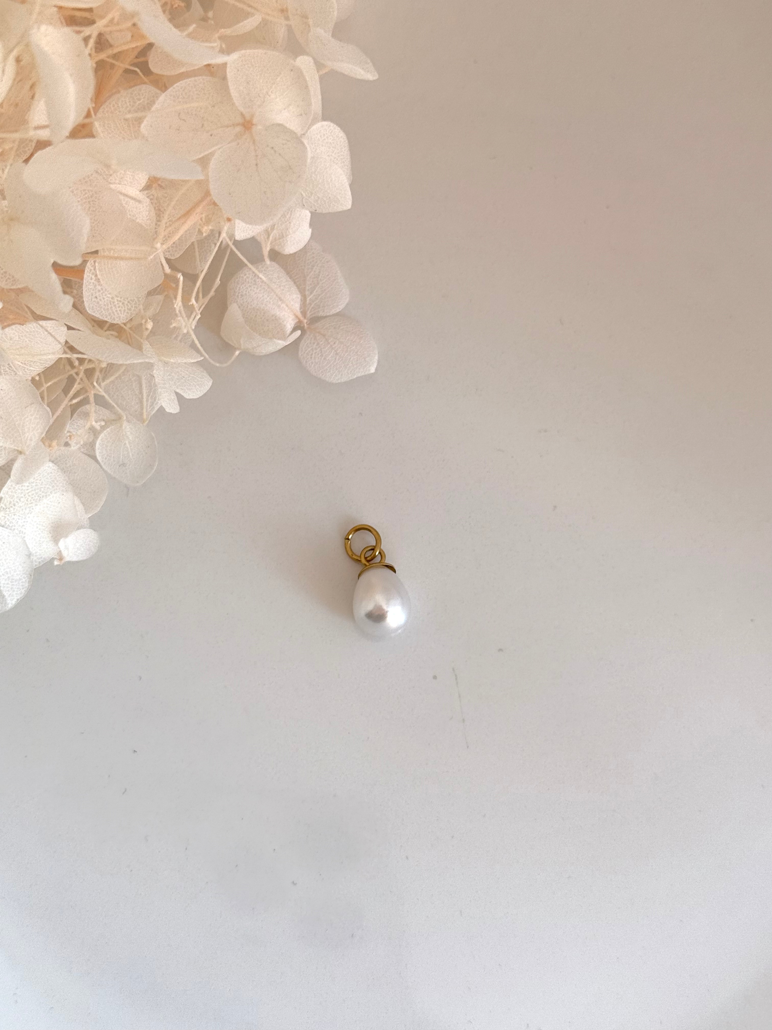 CHARM LUZ DE PERLA